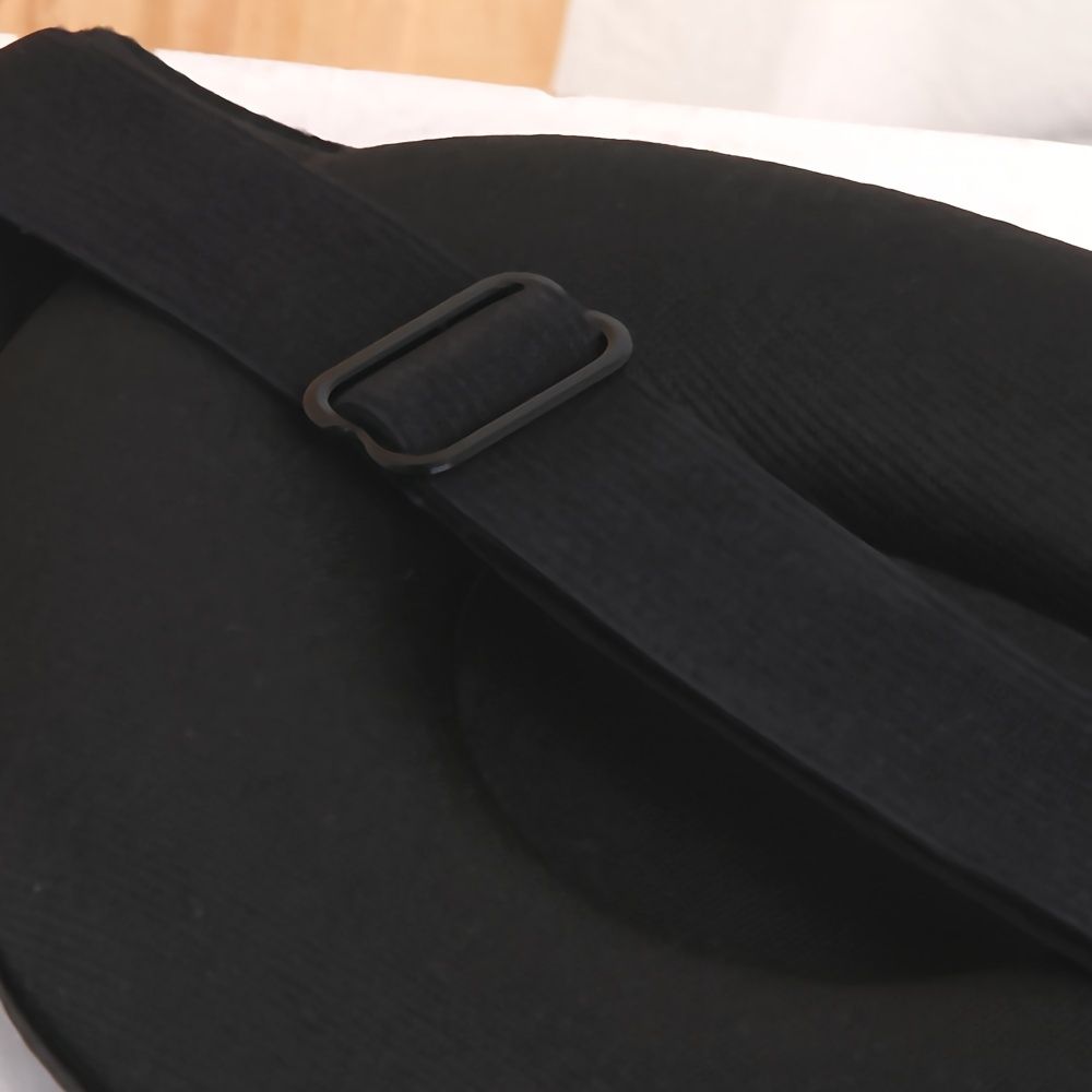 Close-up of mindflo deep sleep mask with a strap on a white surface